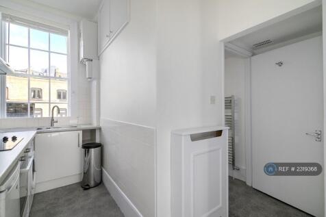Kitchen And Door To Bathroom