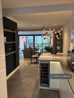 Kitchen Into Dining Area Integrate Wine Fridge