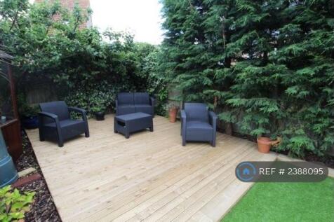 Enclosed Patio In Rear 
