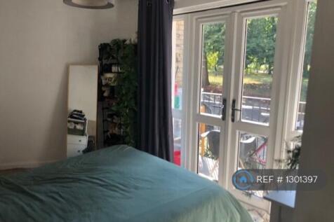 Bedroom With Patio Doors And Terrace