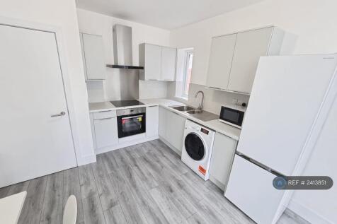 View Of Kitchen From Living Area. 