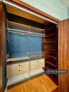 Primary Bedroom Walk-In Wardrobe
