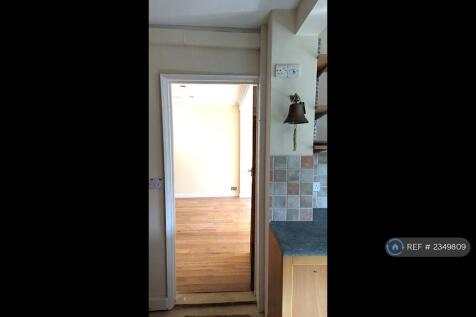 Kitchen View Extending To The Main Living Room