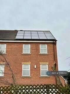 Back Of House With Solar Panels 