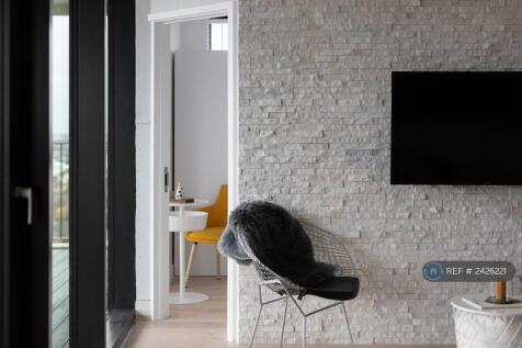 50 Inch Smart Television With Stone Feature Wall