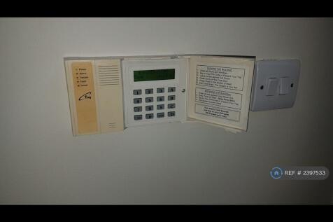 Alarm System With Integral Key Fob Swipe Facility