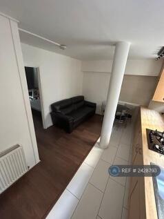 Open Plan Lounge With Kitchen