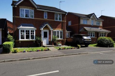 Front Of House With Lovely Gardens