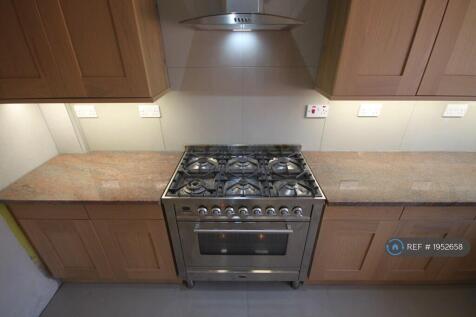 New Oak Kitchen With Stainless Steel Range Cooker
