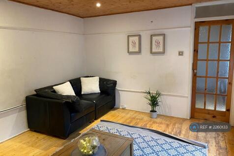 2 Sofas And An Arm Chair