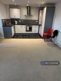 Open Plan Lounge With Kitchen