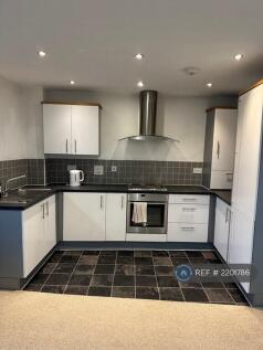 Open Plan Lounge With Kitchen
