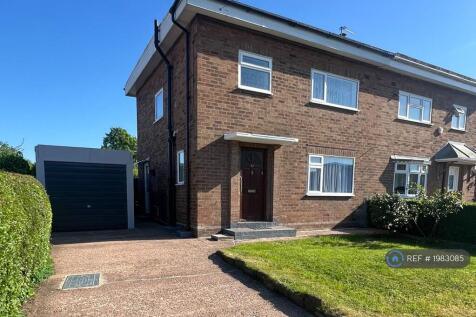 Front Of House And 2 Car Drive
