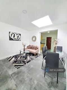 Room 1 - Living Space With Diner Rooftop View 2