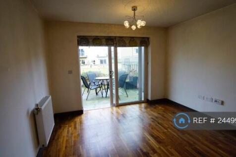 Lounge And Patio With View To Communal Gardens.