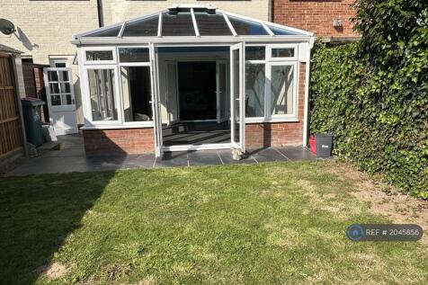 Rear Garden And Conservatory
