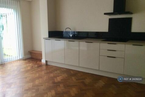 Kitchen Is By The Patio Doors