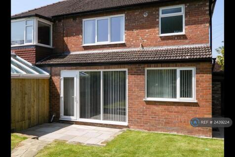 Back Of The House With Door On To Patio