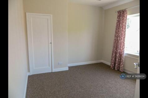 Front Bedroom With Built-In Cupboard