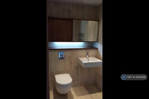 Bathroom With Built-In Vanity Shelving