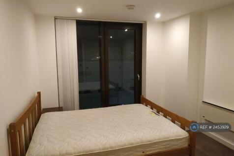 King-Size Bed With Floor-To-Ceiling Windows