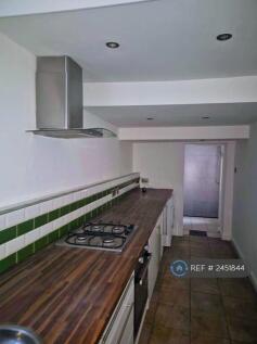 Kitchen Leading To Bathroom