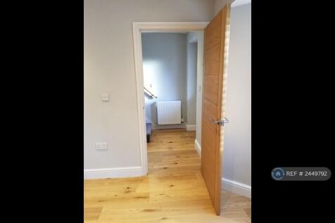 Living Area Has Door To Hallway