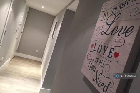The Hallway In The Evening With Downlights