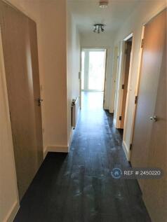 Dark Wood Flooring Throughout Living Areas