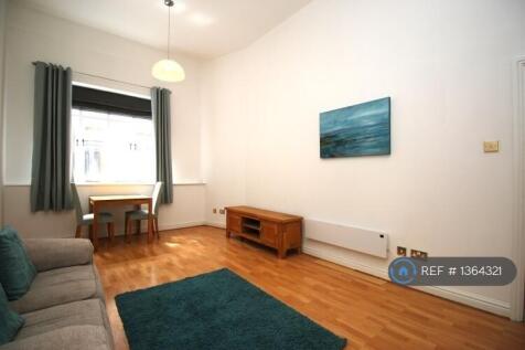 Generously Sized Living Room With High Ceilings
