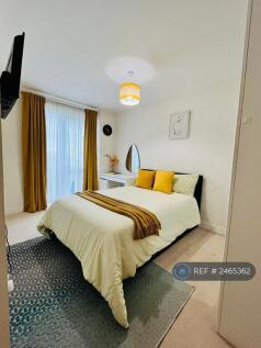 Bedroom With View Of Balcony &amp; Garden