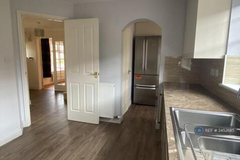 Kitchen With View Of Utility And Hallway