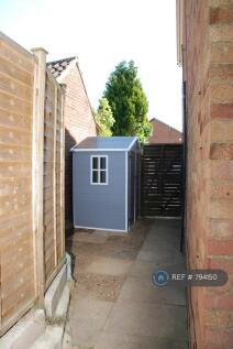 Side Of The House With Garden Shed 
