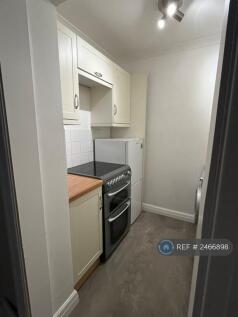 Kitchen Cooker And Fridge 