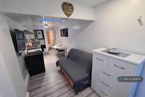 Lounge With Wall-Mounted 40inch Tv, Sofabed, Chest