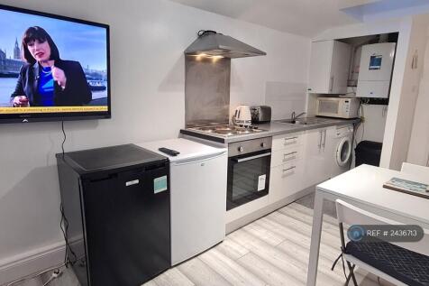 Kitchen With Cooker, Fridge, Washer, Micro Etc.