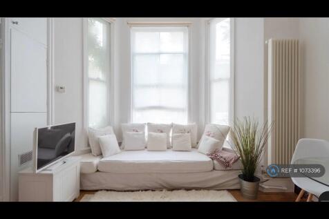 Window Seat, Can Be Occasional Guest Bed.