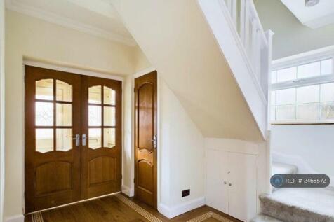 Open, Bright Hallway With Very Large Ceilings