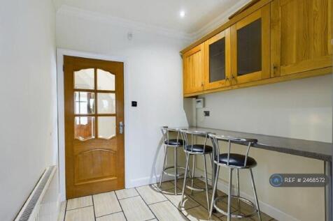 Diner In Long Spacious Kitchen With Chairs