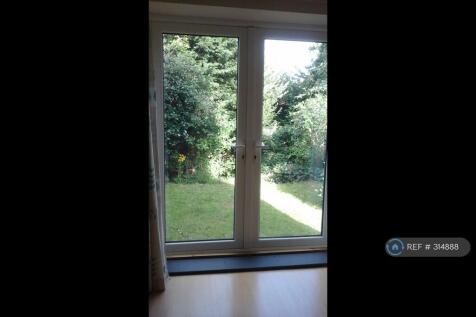 Sitting Room View. Garden Less Pristine Now