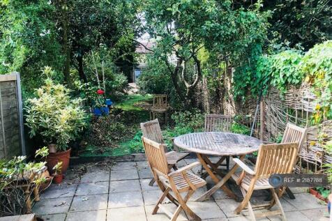 Patio And Large Garden Beyond
