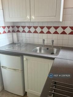 Kitchen Showing Small Fridge/Freezer