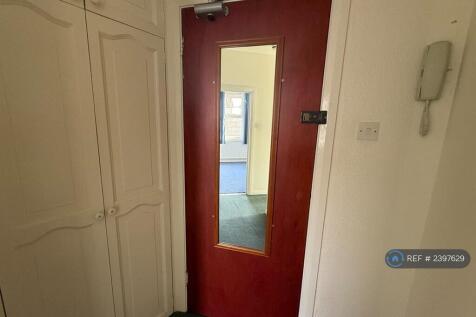 Entry Way With Built In Cupboard And Entry Phone