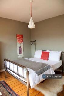 Larger Bedroom. 