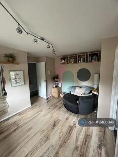 Living Area With Swivel Cuddle Chair