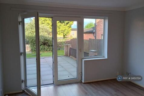 Living Room Patio Windows Onto Large Patio 