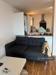 Living Room Adjacent To Kitchen. 