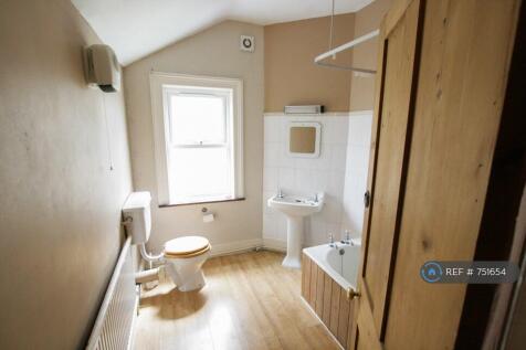 Large Bathroom With Bath And Electric Shower