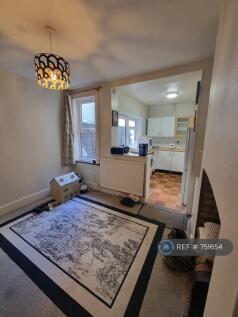 Dining Area Leading To The Kitchen 