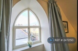 Arch Window In Main Bedroom